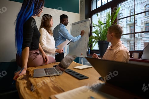 Preview: Multiethnic team of scientist working on new mathematical or physical theory