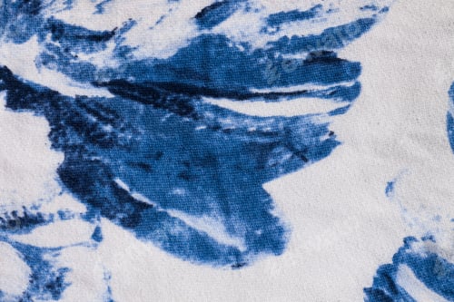 Preview: Tie-dye cotton fabric texture blue and white paint colors. Ancient resist-dyeing textile coloring te