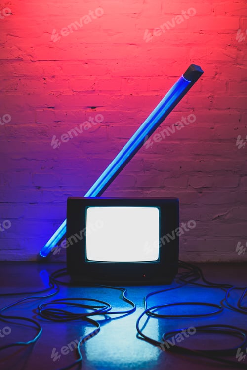 Preview: toned picture of arranged retro tv set, cables and lamp with brick wall background