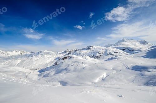 Preview: Alpine winter mountain landscape. French Alps with snow.