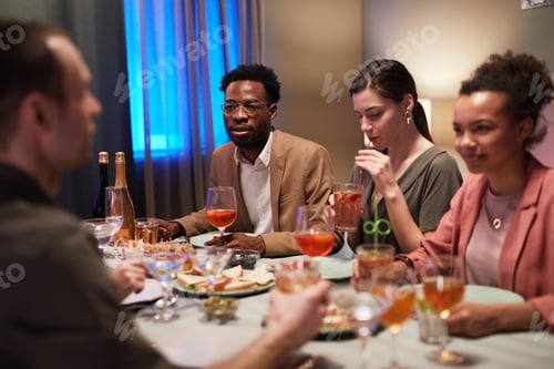 Preview: Friends Gathering at Dinner