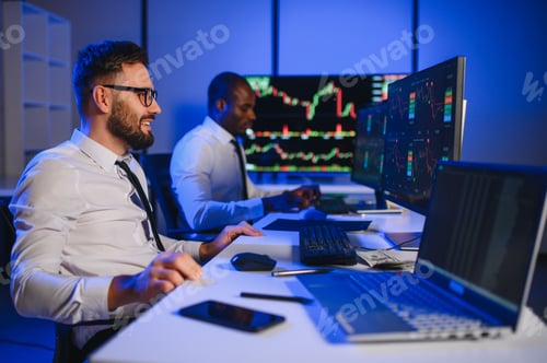 Preview: Financial Analyst Talking to Investment Banker in the Evening at Work.