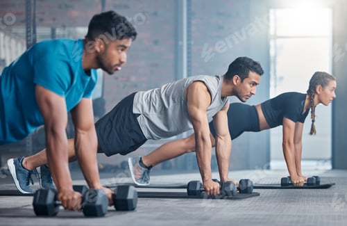 Preview: Fitness, teamwork and group with weights, focus and training for a body goal together in the gym. E