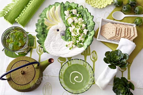 Preview: Overhead view of table with green pea soup, fresh salad and water biscuits