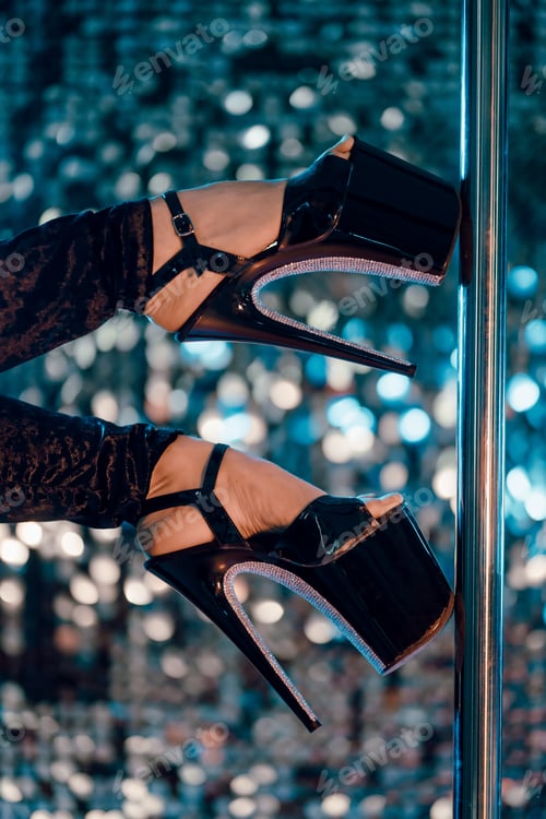 Preview: stripper dances in high heels shoes near pole in night men's club and seduces visitors