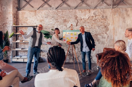 Preview: colleagues shaking hands after the presentation of project business strategy