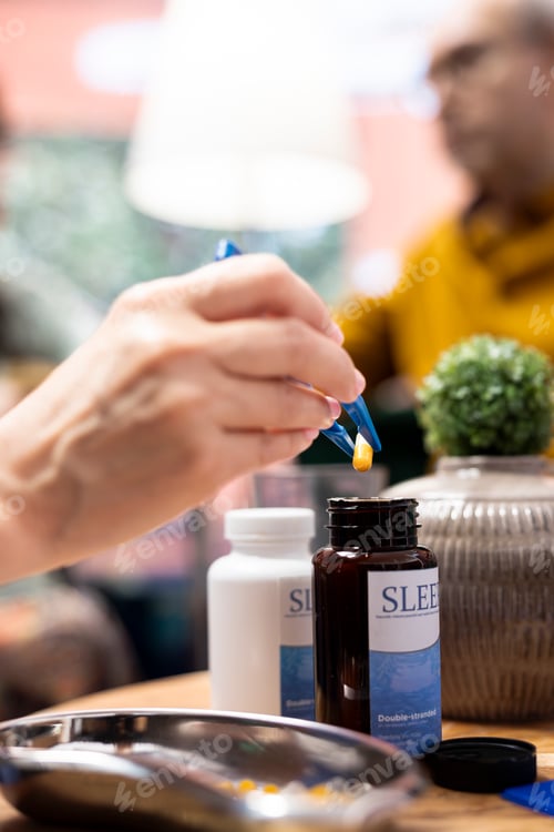 Preview: Medical assistant prepares daily dose of pills and vitamins for elderly patients