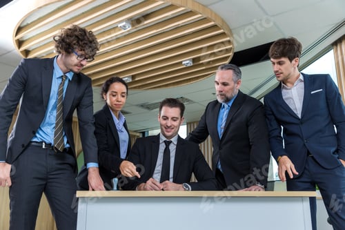 Preview: Diverse colleagues gather in brainstorm discuss statistics together.