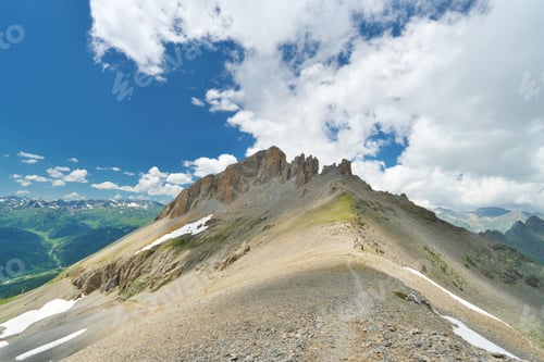 Preview: Mountains peaks and hills at summer day.