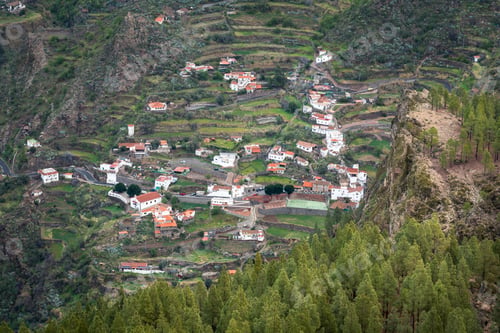 Preview: Aerial view of a village on a grassy hill in the countryside of Spain