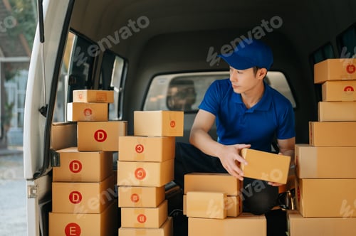 Preview: Portrait of courier delivery Asian man searching the address on digital tablet.