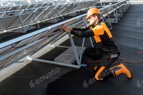 Preview: Electrician connecting solar panels