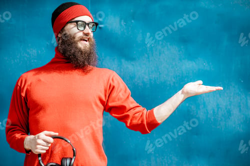 Preview: Portrait of a stylish man on the colorful background