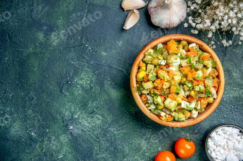 Preview: top view vegetable salad from boiled vegetables mixed inside round plate on dark background photo