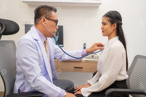 Preview: Doctor using stethoscope to listen heartbeat of elderly patient.