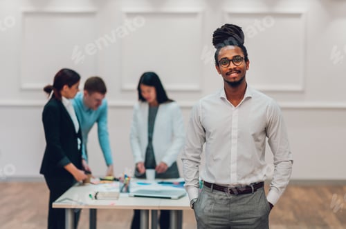Preview: Portrait of a an arabic businessman posing during a meeting in the office