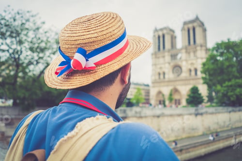 Preview: Handsome Tourist In Paris, France With Cathedral Of Notredame De Paris.