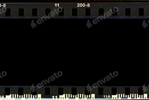 Preview: Real film border strip scan and old texture frame and isolated black space.