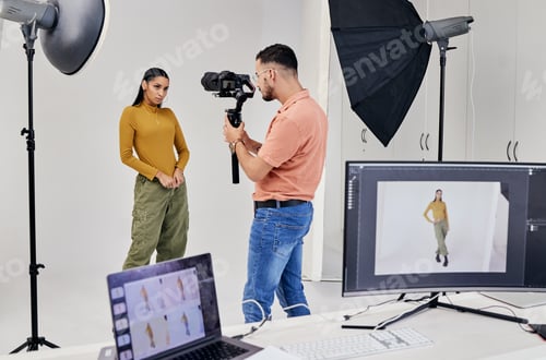Preview: Photography, shooting and photographer with woman fashion model in studio for creative, advertising