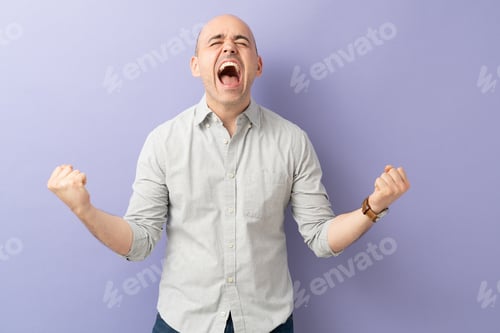 Preview: Man celebrating and screaming in a studio