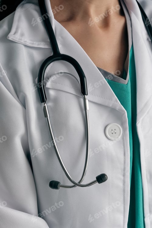 Preview: Medical Professional with Stethoscope and White Coat