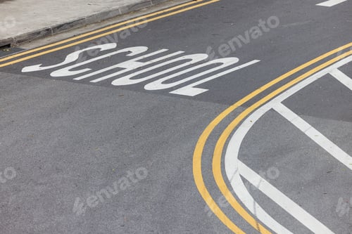 Preview: On the road near the school, the markings have been updated. Yellow and white lines on the asphalt