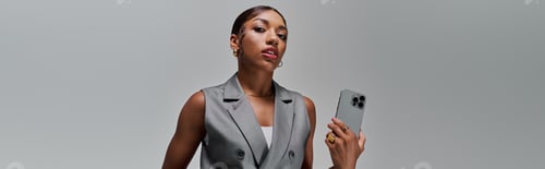 Preview: Stunning young woman exudes confidence in stylish smart casual attire in modern studio