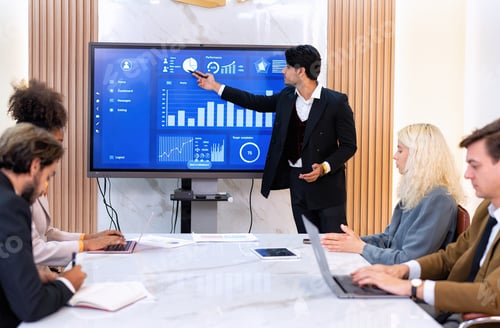 Preview: Employee on job corporate Business colleagues around the table look presentation from large screen