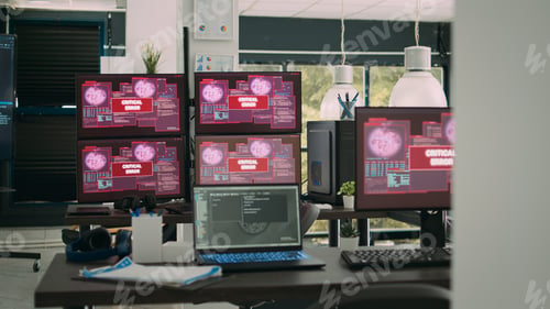 Preview: Computer screens running hacking alert security breach in empty software it agency