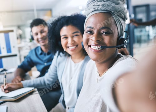 Preview: Portrait of happy african american call centre telemarketing agent taking selfies with diverse coll