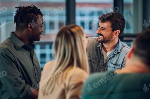 Preview: Multiracial business team working together and having a meeting in the office