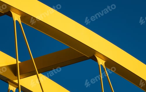 Preview: Fragments of a modern yellow construction with a blue background