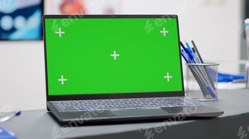 Preview: Laptop with greenscreen display on facility reception counter