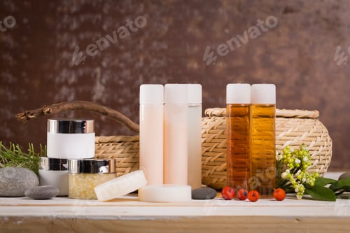 Preview: Natural beauty products arranged artistically on a wooden table with decorative elements
