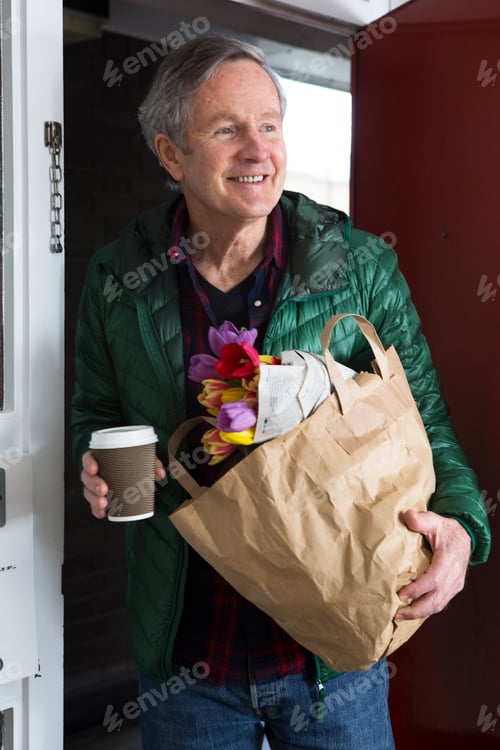 Preview: Man with groceries and cup of coffee