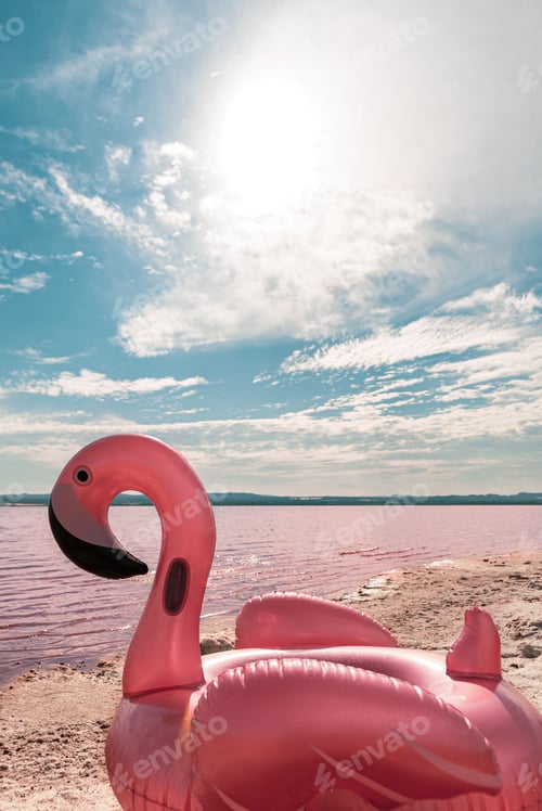 Preview: inflatable pink pelican mattress on pink sea