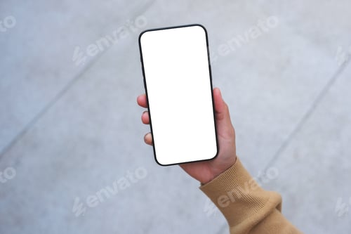 Preview: Top view mockup image of a woman holding mobile phone with blank desktop white screen