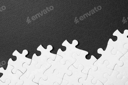 Preview: Blank white puzzle pieces on black background, flat lay. Space for text