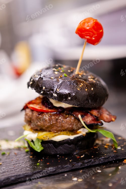 Preview: Black burger on stone cutting board