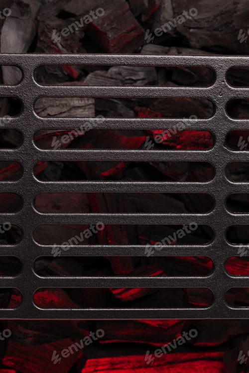 Preview: Metal barbecue grill over hot coal