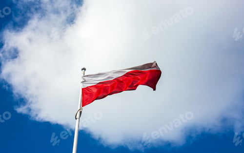 Preview: Polish Flag on a Pole over beautiful Sky.