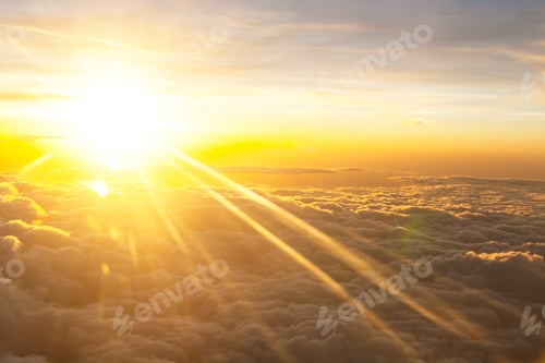 Preview: Golden Sunlight Breaking Through Clouds at Sunrise