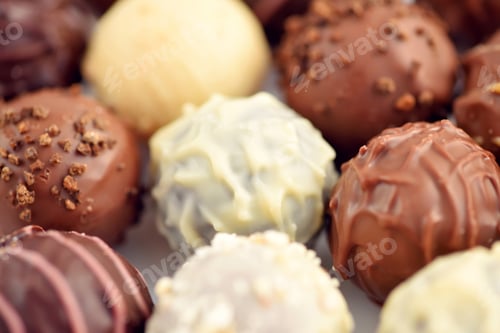 Preview: Close-up Assorted of chocolate candies. Selective focus