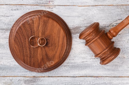 Preview: Gavel and wedding rings.