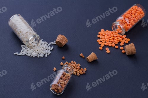 Preview: Three mini bottles with different colorful grains.
