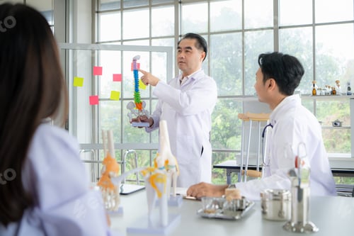 Preview: A medical professor is lecturing on a case study related to disease treatment to medical students