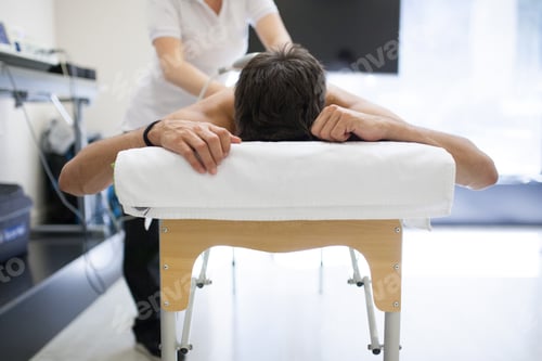 Preview: physiotherapist applying massage