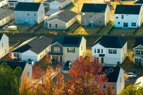 Preview: Aerial view of tightly packed homes in South Carolina residential area.