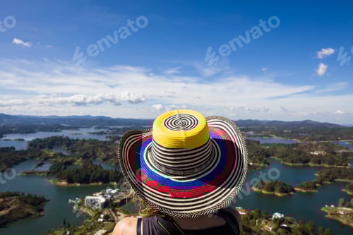Preview: Young woman at Guatape lake in Antioquia, Colombia