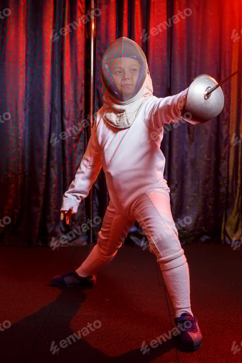 Preview: Girl in a fencing costume with a sword in hand, neon light. A young model trains and trains